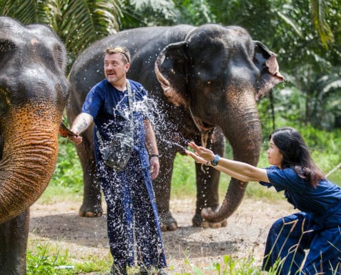 splash the water to an elephant, Krabi Elephant House Sanctuary